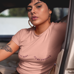 Load image into Gallery viewer, A photo of a woman wearing the It&#39;s My Body It&#39;s My Choice Boxy Crop. It&#39;s a dusty pink color shirt with a burgundy print.
